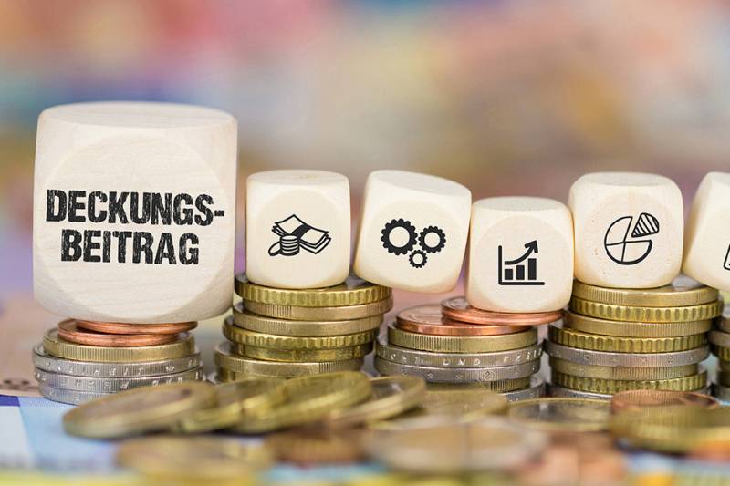 Würfel mit der Aufschrift Deckungsbeitrag